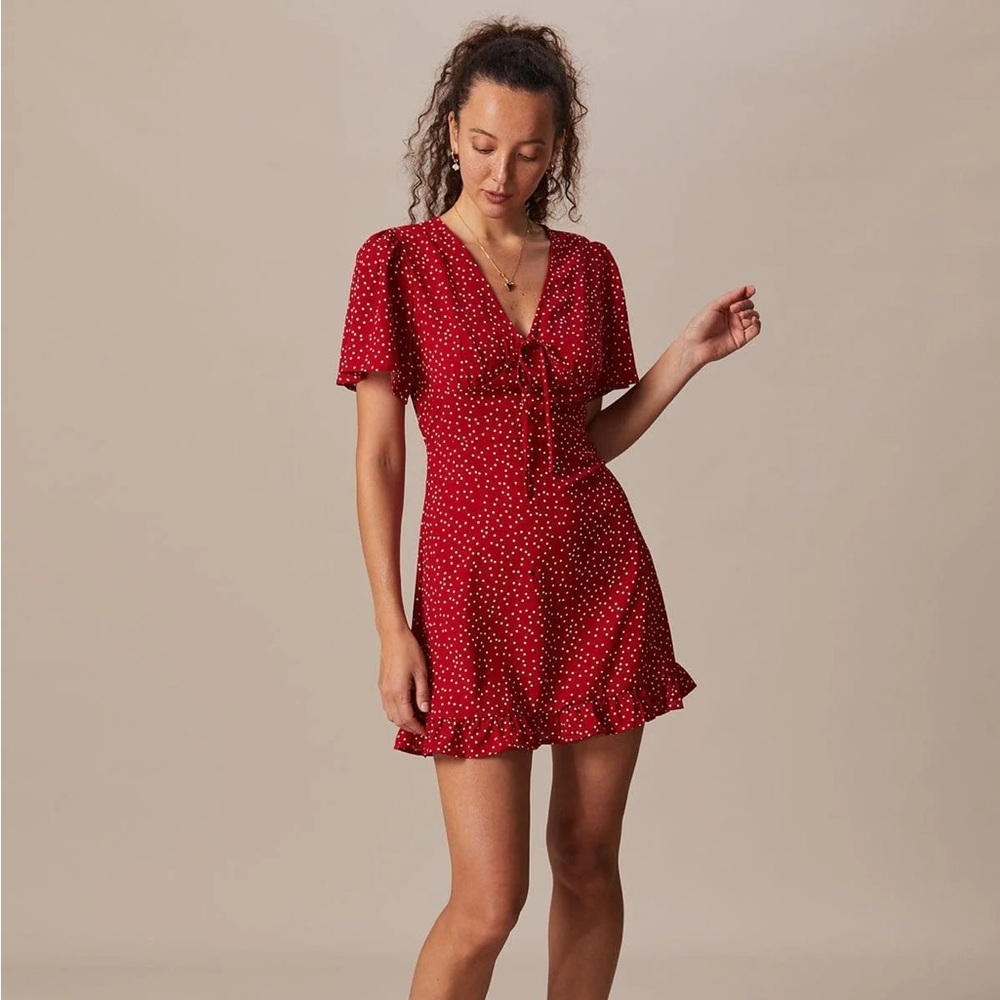 The Red V Neck Polka Dot Flounce Mini Dress
